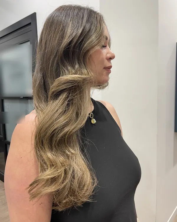 Long bronde balayage with sculpted waves by Aprille at Novum Hair Studio in Mission Valley